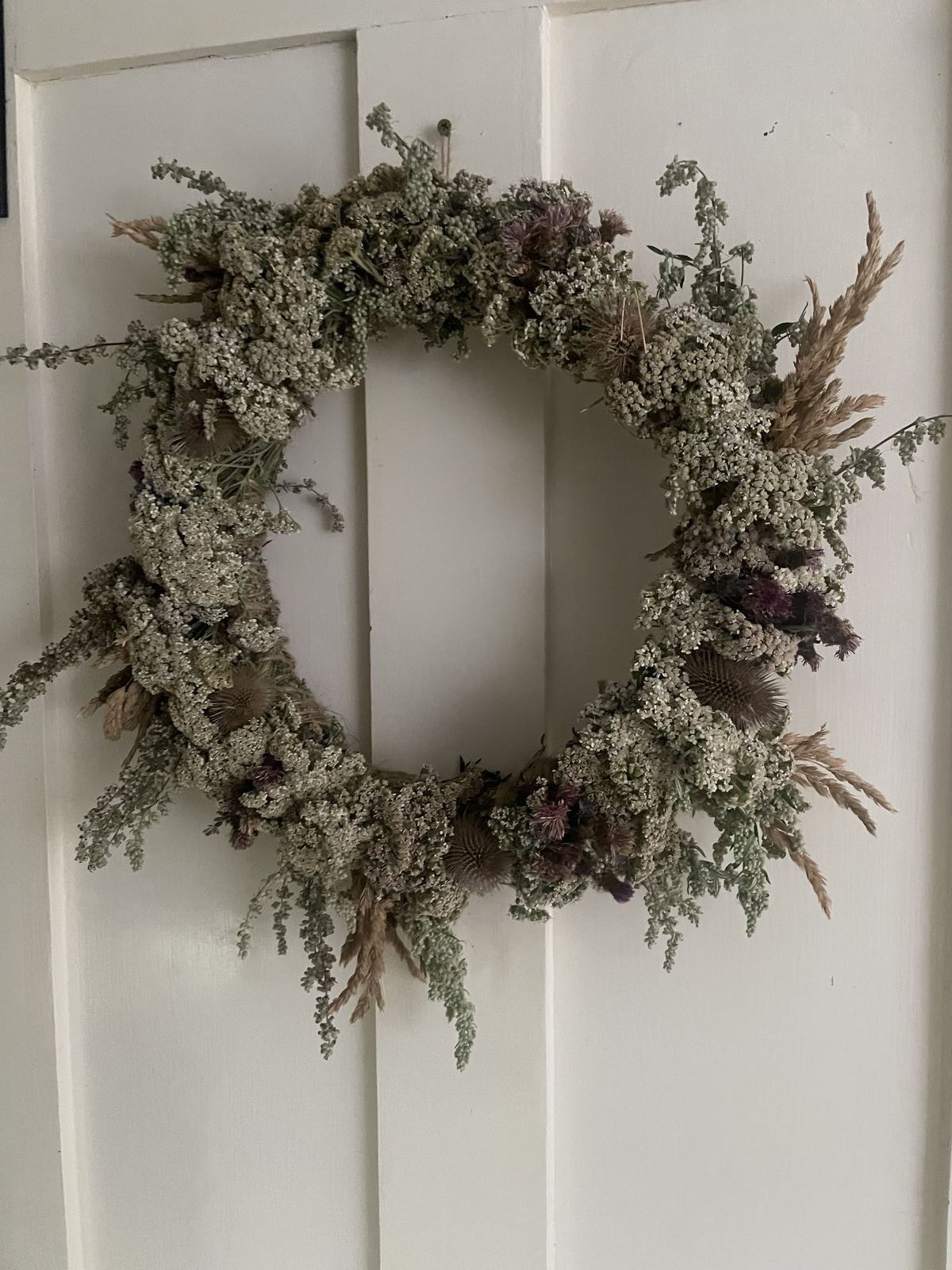 Dried flower wreath in sage and cream tones